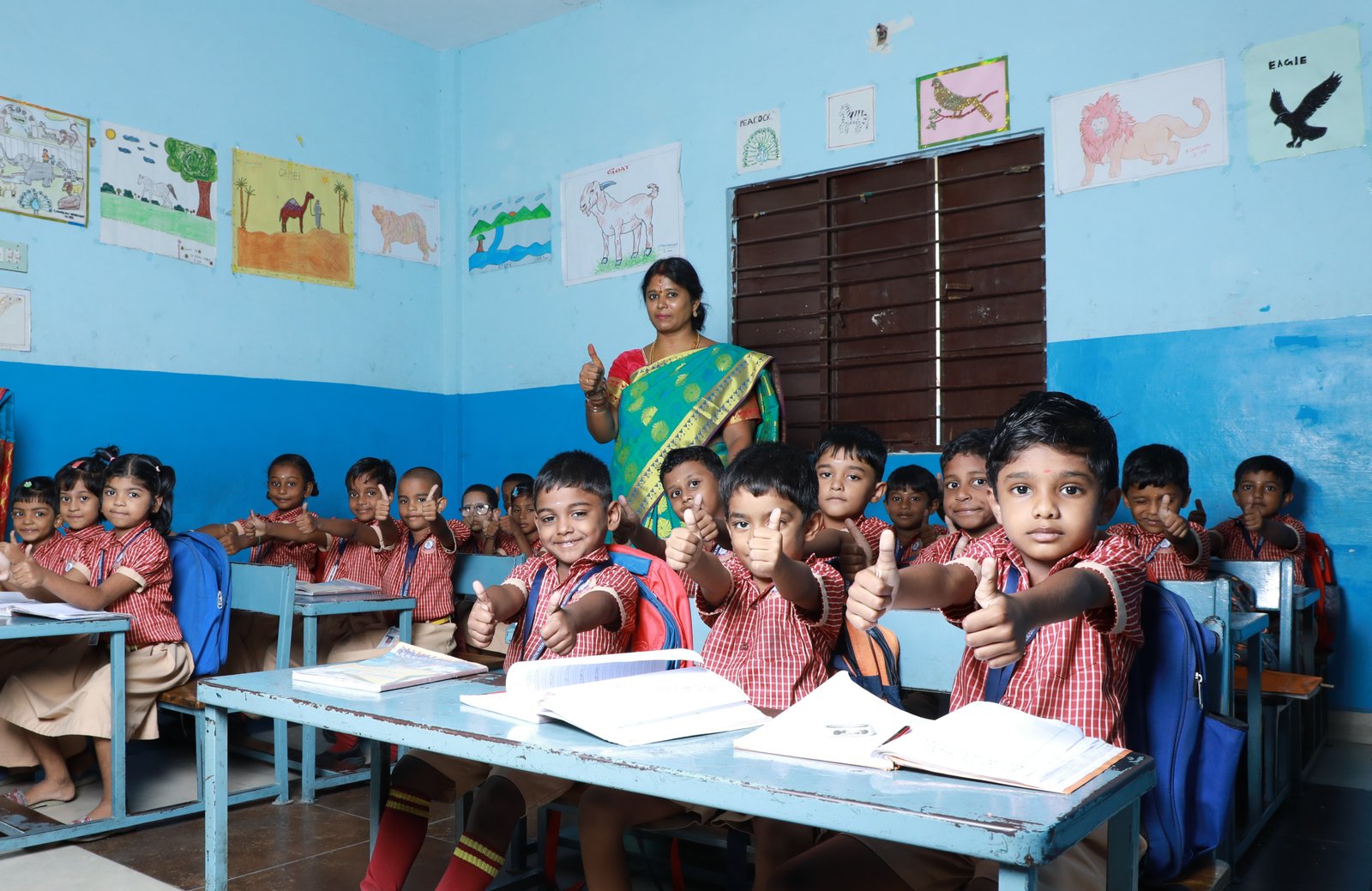 Teacher with students at Bharathi Vidyalaya